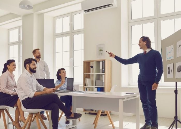 Images of a leader giving a presentation on strategic leadership.