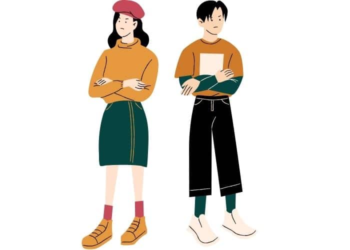 Boy and girl crossing their arms.